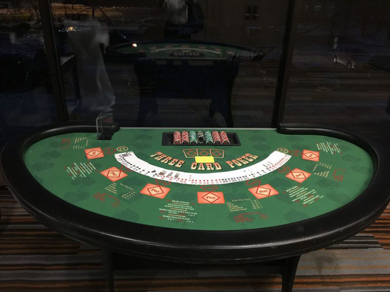 Three Card Poker Table set up and ready for players.