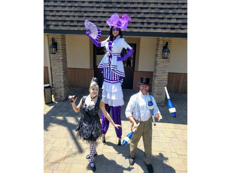 Stilt Walkers and Buskers ready to perform.