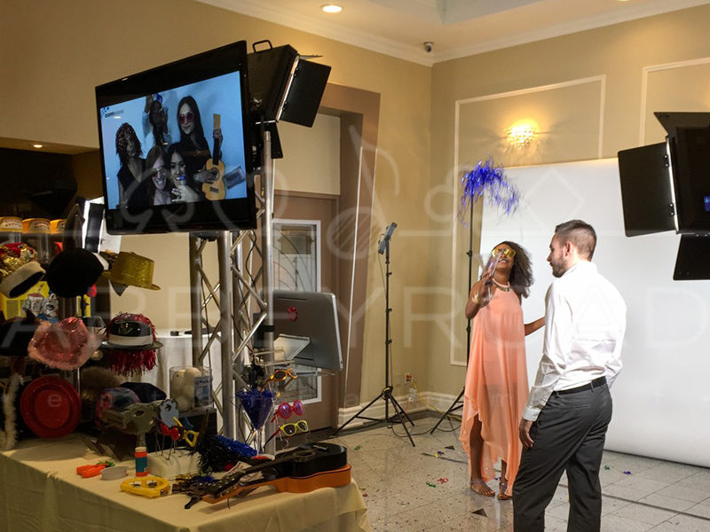 People posing for their video at the Slo-Mo Video Booth.