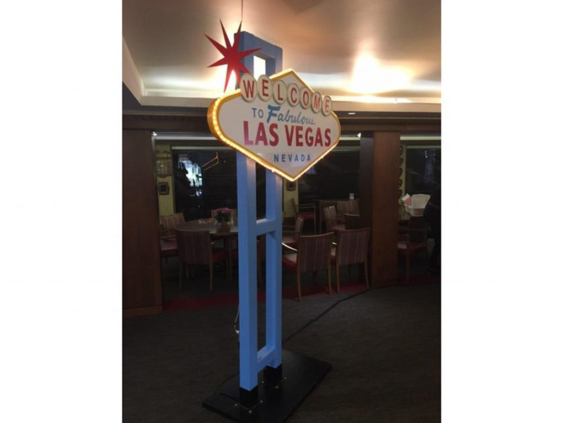 Las Vegas Sign at the entrance of a party.