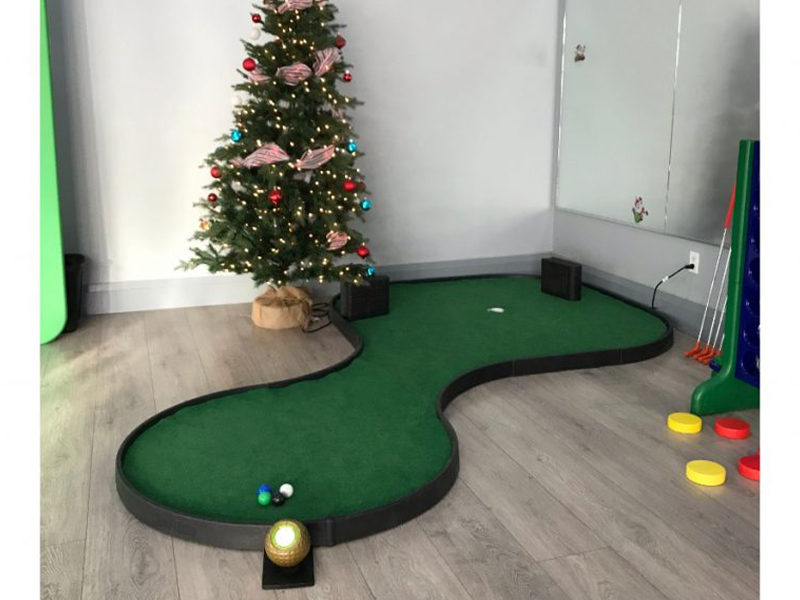 Mini Golf Hole at a Holiday Party.
