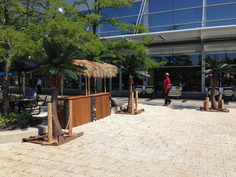 Three Artifical Palm Trees set up for event.