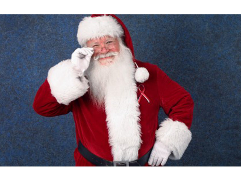 Cheerful Santa Claus ready to greet families.