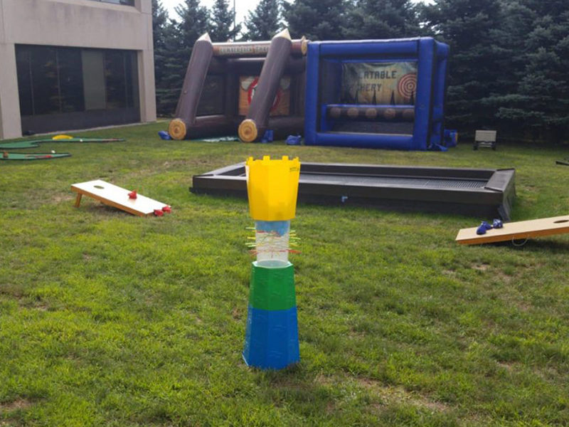Giant Kerplunk rental set up for an outdoor event.