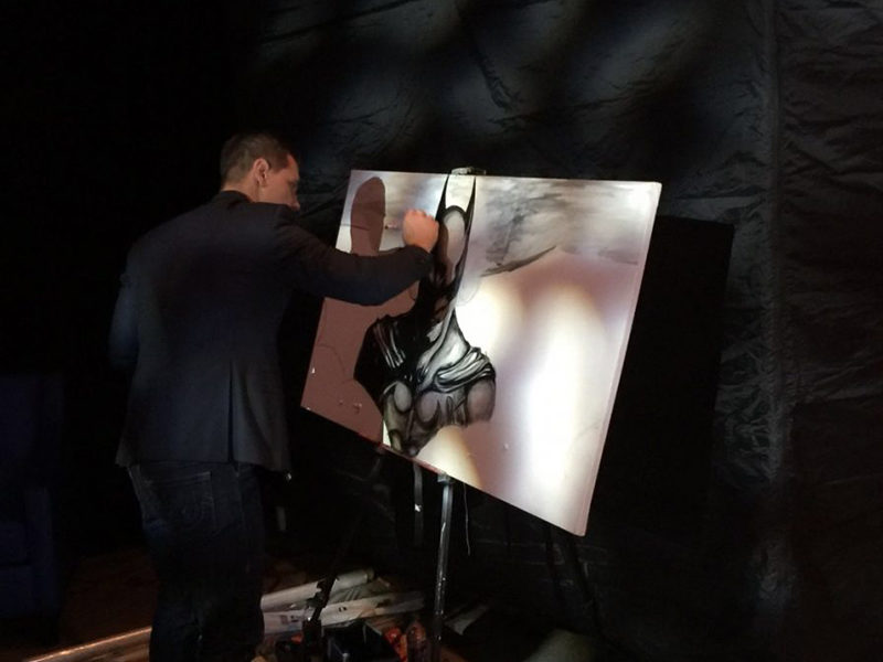 Man Painting for a Live Art Performance.