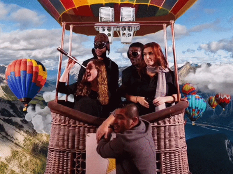 People posing in Hot Air Balloon Basket GIF.