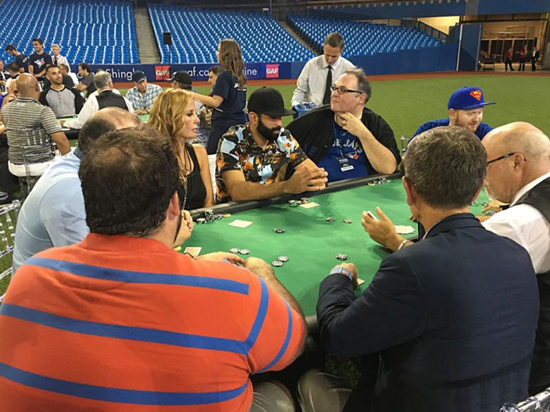 People playing poker at event in Toronto.