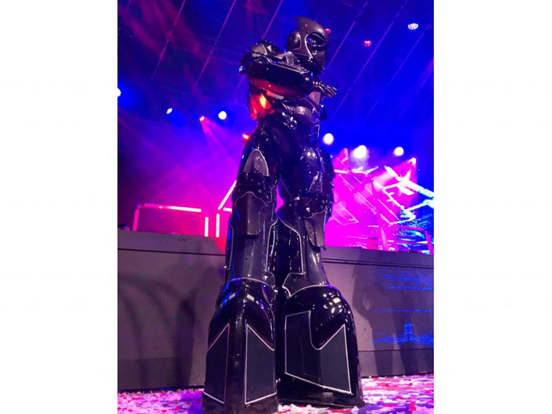 Giant LED Robot rental standing tall at event.