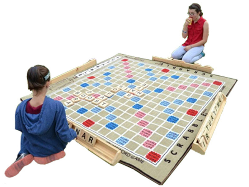 Two Children playing the Giant Scrabble rental in Toronto.