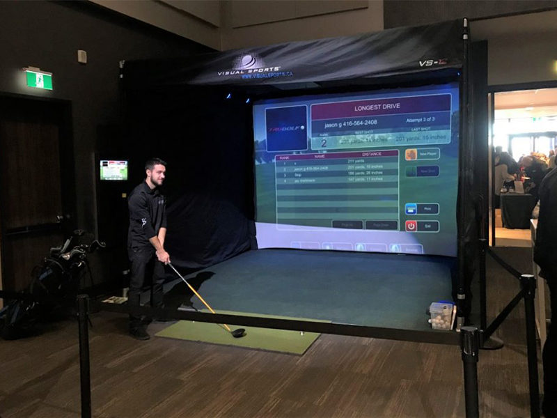 Man ready to swing for the Golf Simulator rental.