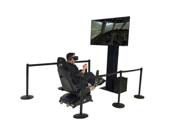 Man playing VR Flight Simulator.