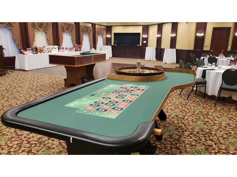 Angled view of a 10-foot authentic casino roulette table