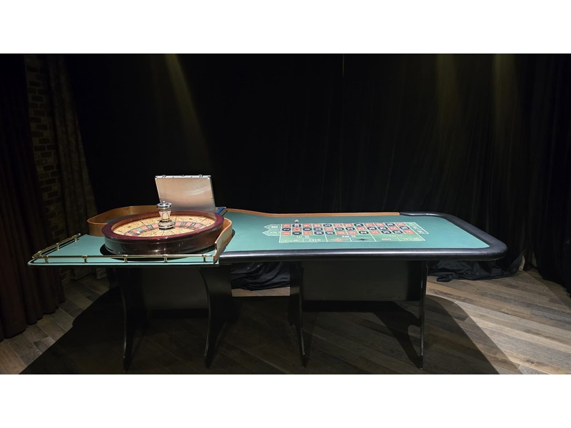 Full side view of a 10-foot authentic roulette table rental