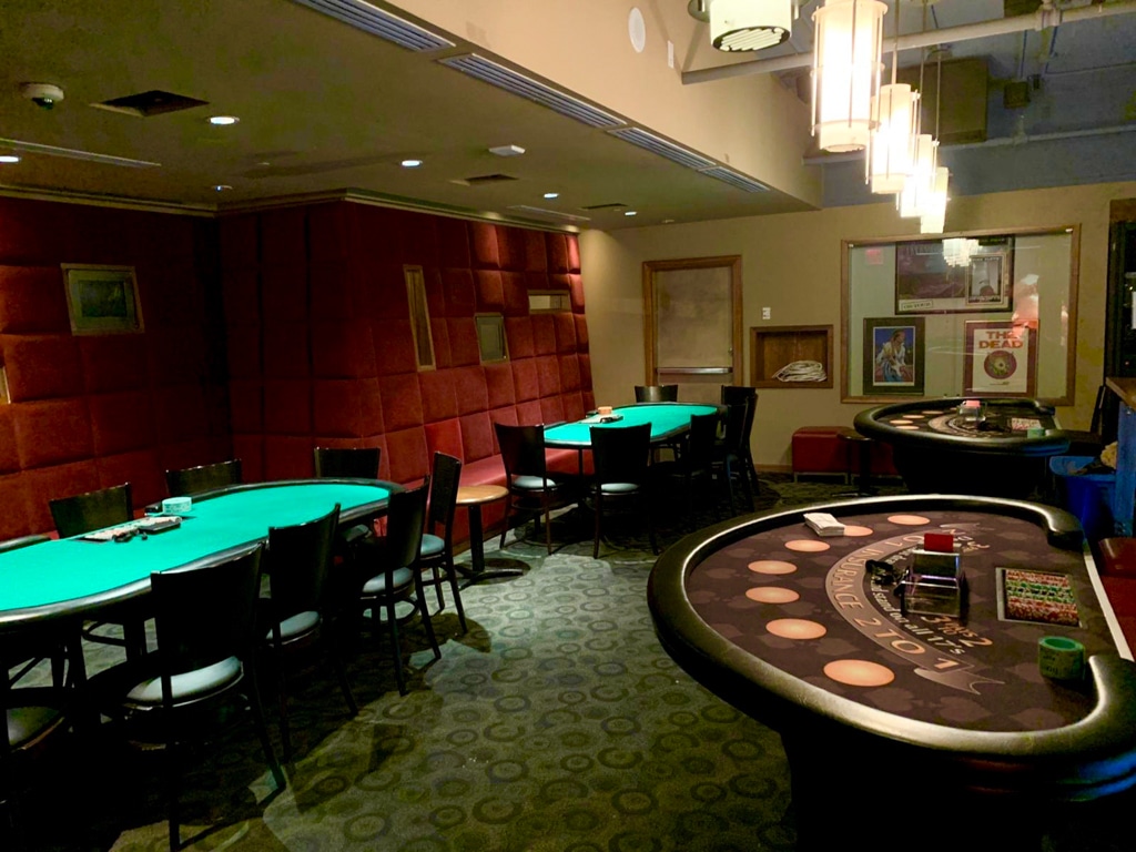 Casino tables with professional dealers at a corporate holiday party