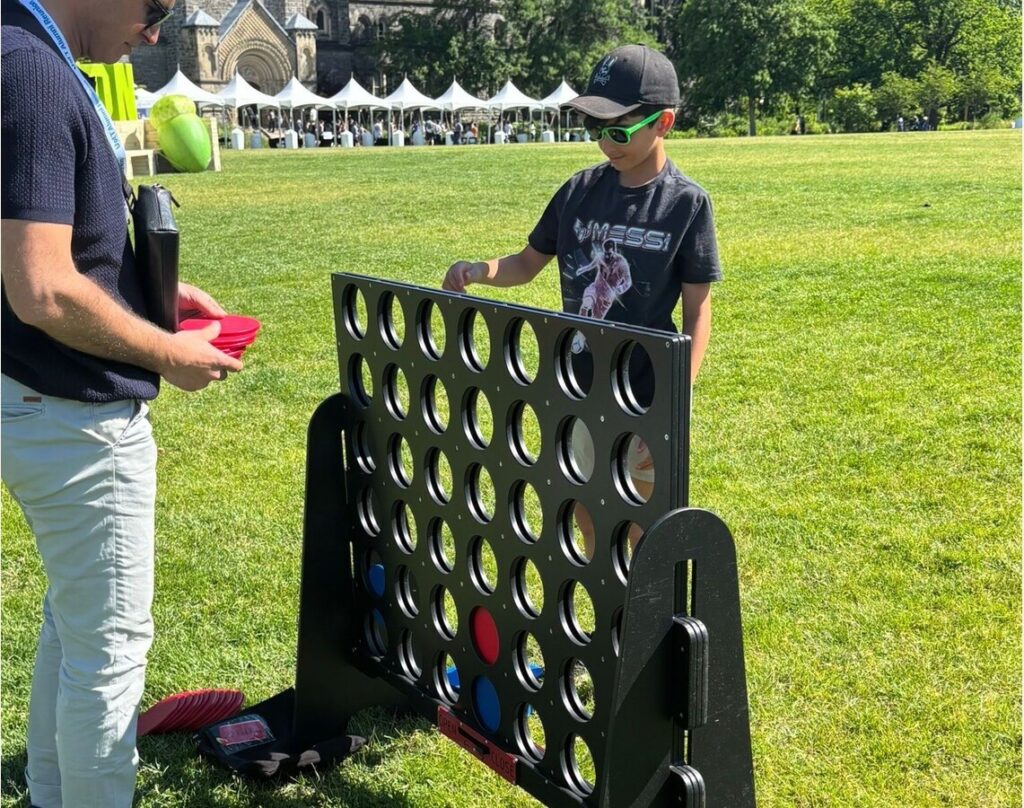 Inflatables and games at a Toronto company picnic