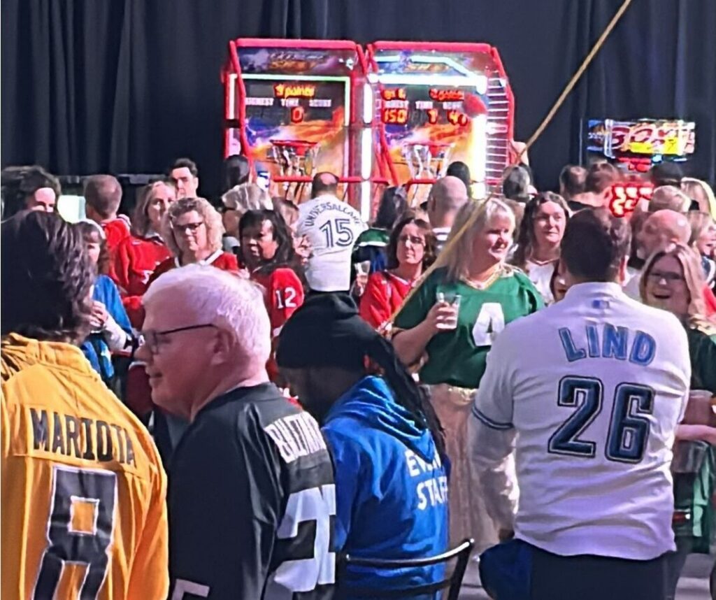 Supporters participating in activities during a fundraising gala