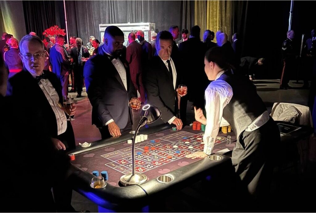 Guests enjoying games and entertainment at a Toronto office Christmas party
